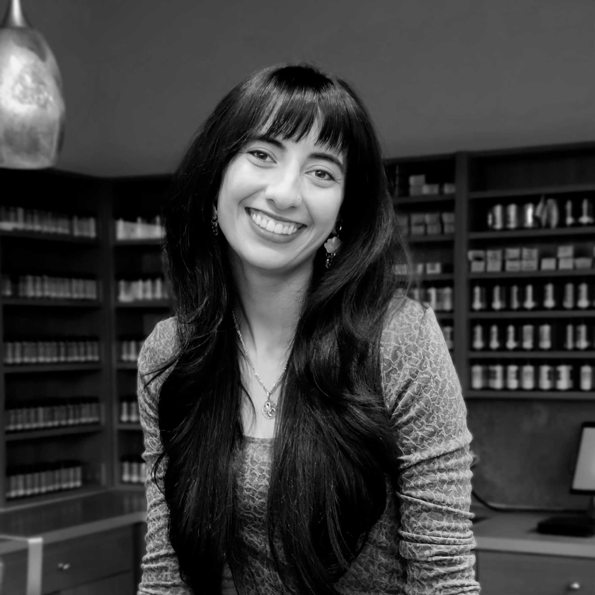 Portrait of Taylor Hess, a professional stylist at Yacht Club Salon, showcasing their expertise and style.